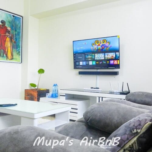 Spacious luxury Airbnb living room at Mupa Condo in Nyahururu, perfect for a Kenya staycation or comfortable BnB experience